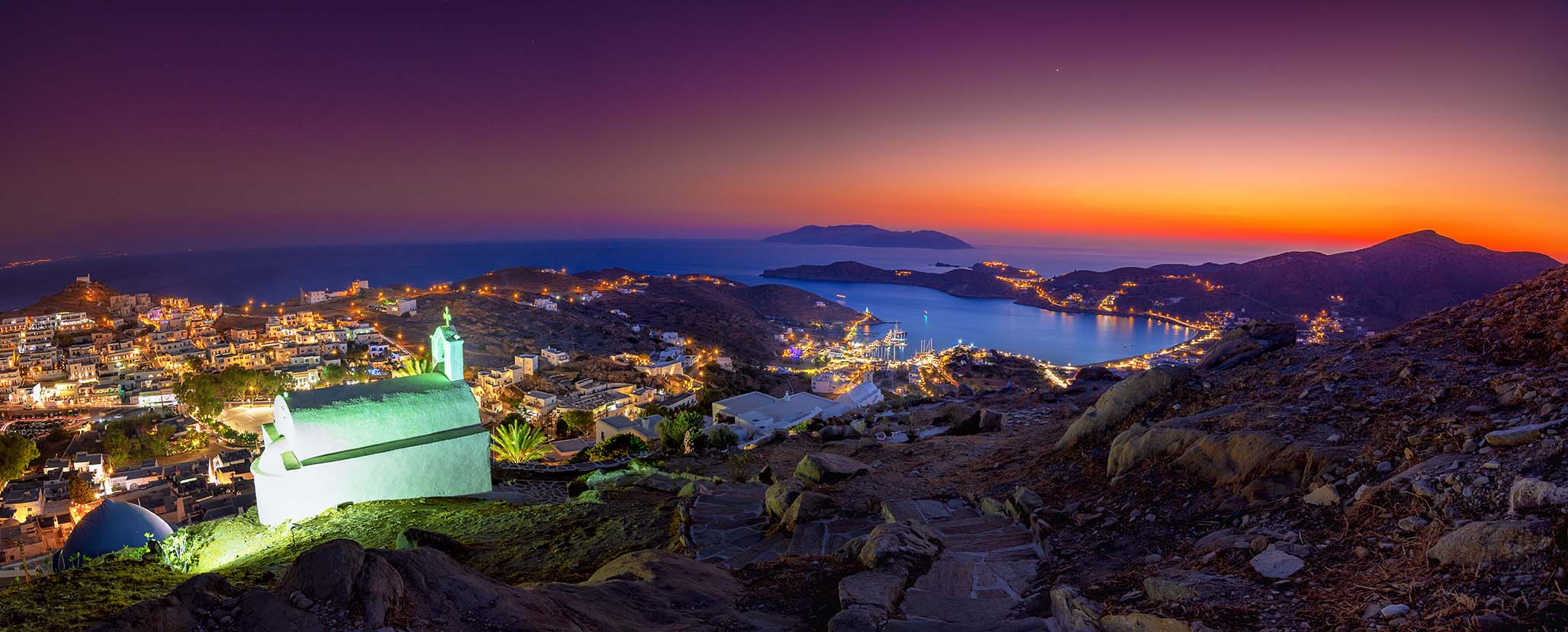 Panorama of Ios Chora and old harbor at sumset, Cyclades, Greece2